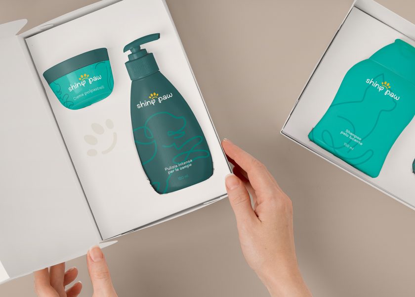 La confezione Shiny Paw aperta, con crema, sapone e flacone